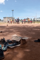Volleyball training session held on dirt court in Kenya