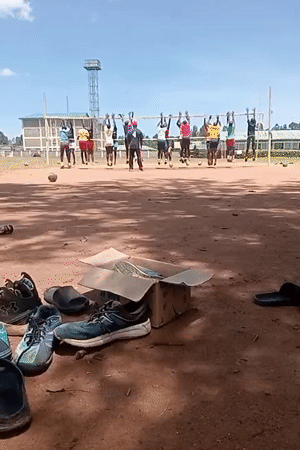 Volleyball training session held on dirt court in Kenya