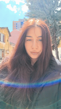 Woman takes selfies indoors in Stara Zagora, Bulgaria