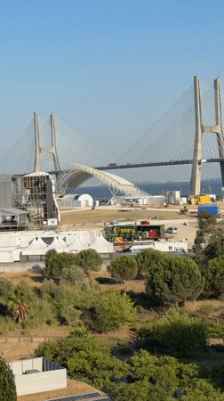 Bridge event setup and a parked convertible in Loures, Portugal