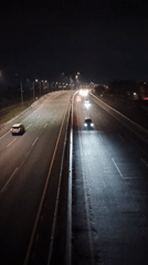 Night traffic on a busy Indonesian highway, multiple aerial angles