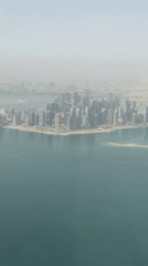 Aerial view captures Doha skyline in morning haze