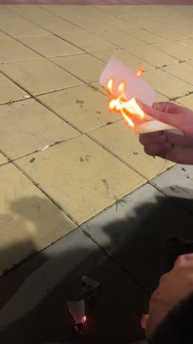 Man displays cartoon cards, burns paper in Bulgarian town