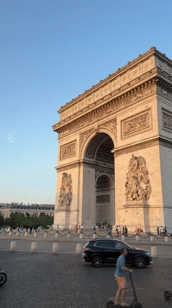 Arc de Triomphe on a clear Paris evening, two angles