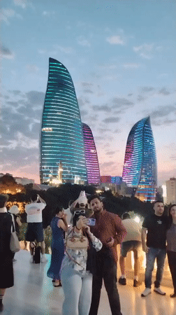 Baku's Flame Towers glow at dusk from Sabail viewpoint