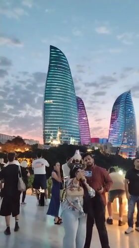 Baku's Flame Towers glow at dusk from Sabail viewpoint