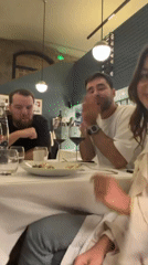 Upscale dinner party documented at Lyon restaurant