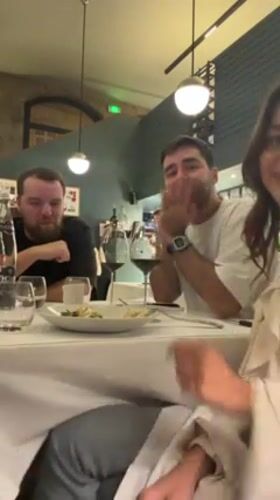 Upscale dinner party documented at Lyon restaurant
