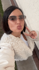 Woman films selfie video in residential Sarapul, Russia