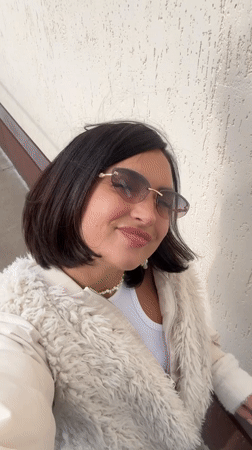Woman films selfie video in residential Sarapul, Russia
