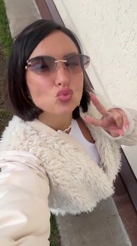 Woman films selfie video in residential Sarapul, Russia