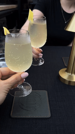 Cocktails and candlelight at a moody Rome restaurant