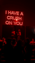 Neon love sign illuminates Milan nightclub scene