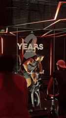 Indoor cycling class in session at Puebla fitness studio