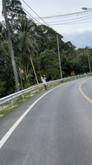 Road infrastructure documented on curved roadway in Ko Kaeo