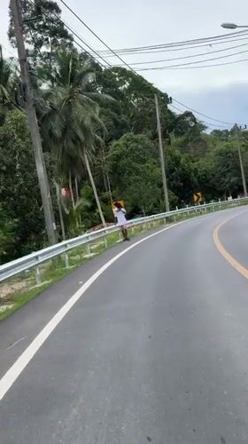 Road infrastructure documented on curved roadway in Ko Kaeo
