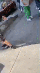 Man on ground draws crowd on NYC sidewalk