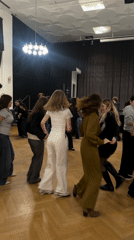 Young women dance in Strasbourg venue with wooden floors