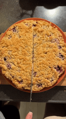 Moscow resident serves homemade berry crumble on Friday evening