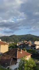 Tourist captures sunny afternoon views of Bulgarian mountain town
