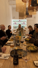 Group dinner featuring Italian cuisine captured at Ibiza restaurant