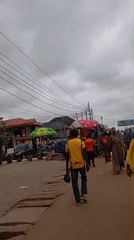 Urban market street activity documented across 45-minute span