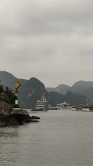Cruise ship sails through Ha Long Bay, Vietnam