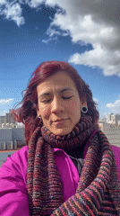 Woman takes rooftop selfies during Buenos Aires barbecue gathering