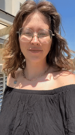Woman outdoors, #Build hashtag captured in Podgorica