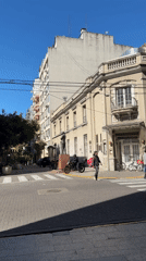 Buenos Aires shoppers document commercial district, water-themed advertisements