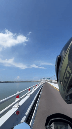 Routine traffic filmed on Bali Mandara Toll Road bridge