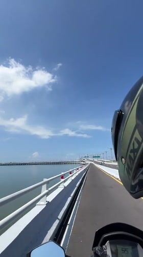 Routine traffic filmed on Bali Mandara Toll Road bridge