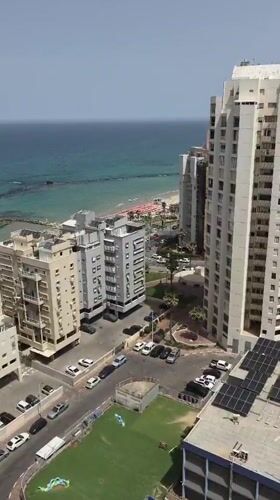 Aerial footage captures morning beach scene in Bat Yam