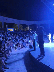 Outdoor amphitheater show lights up a Kuşadası night