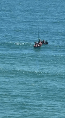 Boats sail in calm waters off Netanya coast