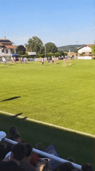 Youth soccer match played under sunny skies in Maclas