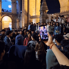 Nighttime crowd gathers in Arequipa public square