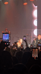 Concert performance by gold-clad female singer in Kaliningrad