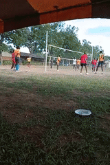Outdoor volleyball game draws players and spectators in Turbo