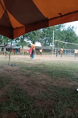 Outdoor volleyball game draws players and spectators in Turbo