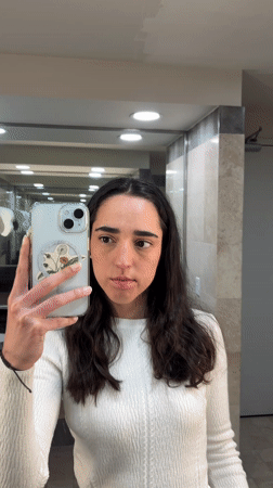 Woman Takes Bathroom Selfies While Applying Mascara