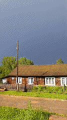 Summer storm hits rural Zipunovo, Russia, garden weathers the rain