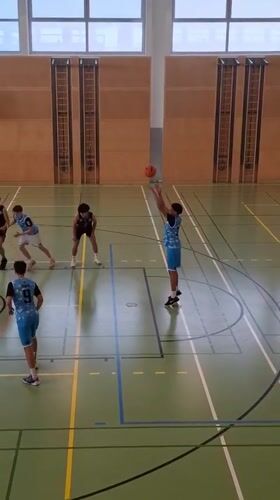 Young basketball players compete in Vienna gymnasium
