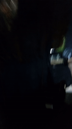 Evening street vendors and transport activity documented in Ikeja