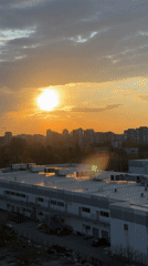 Person documents sunset and takes selfies in Plovdiv apartment