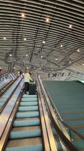 Evening commuter activity documented at Delft train station