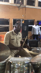 Multi-musician performance captured with drums and keyboard players