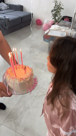 Amanda's 7th birthday cake, candles lit and blown out
