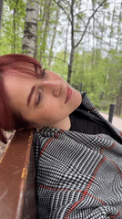 Red-haired woman spotted at park bench, pavement locations