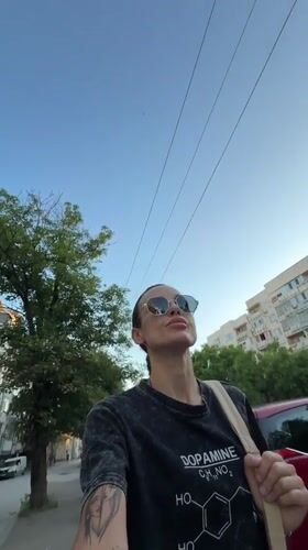 Woman in dopamine shirt recorded walking, lying on Pleven sidewalk